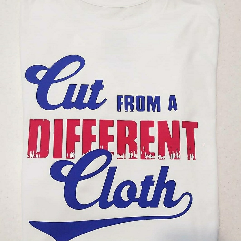 "CUT FROM A DIFFERENT CLOTH" BRAND NEW TEE.